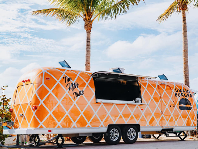 Umami Burger orange Airstream vending trailer