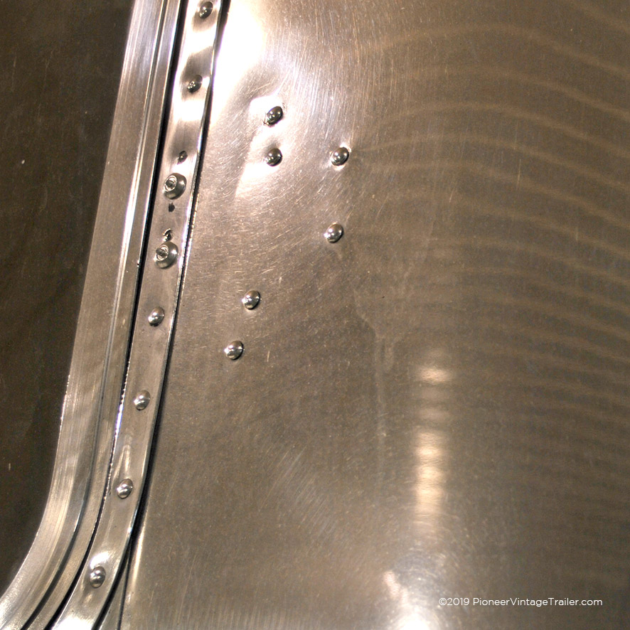 Airstream with rivets filling holes