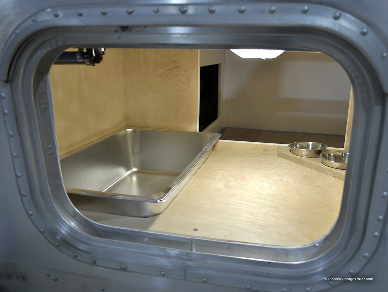 1969 Airstream Overlander cat litterbox view from outside access