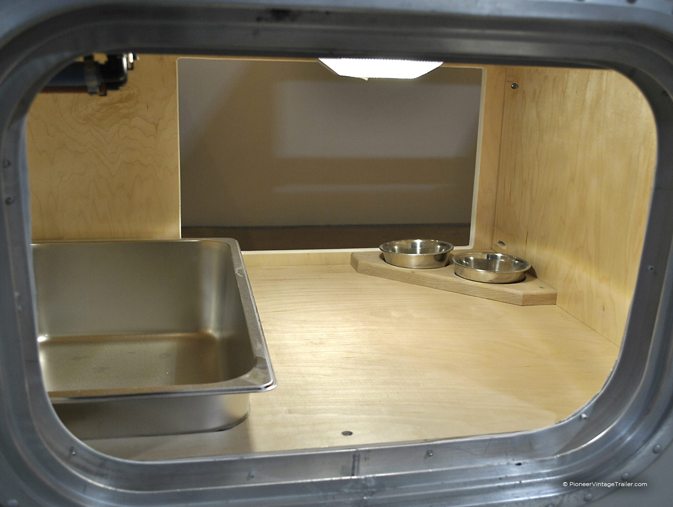 1969 Airstream Overlander cat litterbox view from outside access